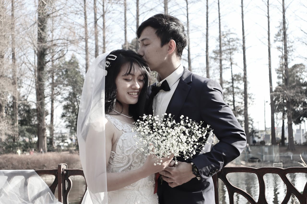 Elegant outdoor wedding portrait of a couple embracing in Tokorozawa, Japan.